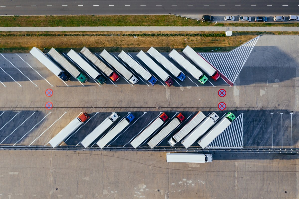 Aerial view of freight trucks at a logistics hub